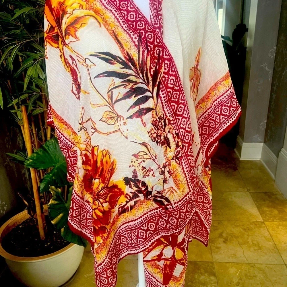Vince Camuto ladies wrap one size NWOT. Cream yellow and red colors one size